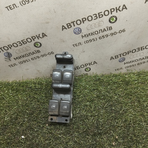Кнопковий блок керування склопідіймачами передній лівий 7M3959857B VAG