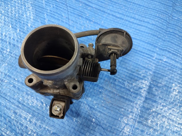 Дросільна заслінка в зборі 351002XXXX HYUNDAI