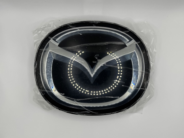 Фірмовий значок решітки радіатора BERC51730 MAZDA