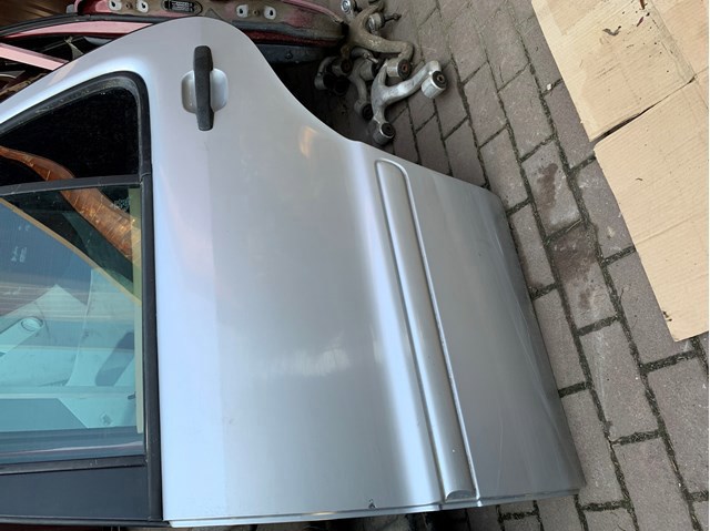 Двері пасажирськи задні ліві A1637301505 MERCEDES