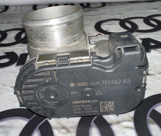 Дросільна заслінка в зборі 06K133062AS VAG