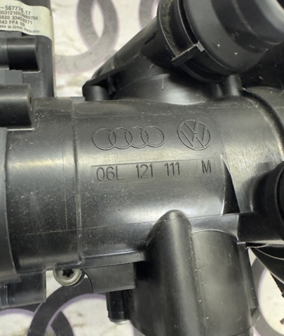 Термостат в зборі 06L121111M VAG