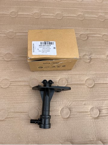 Форсунка омивача фари передньої, правої 4M0955102B VAG