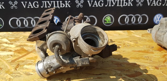 Турбонаддув 06J145702K VAG