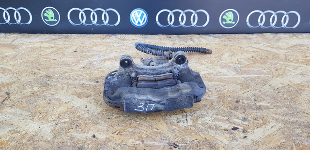 Супорт гальмівний задній правий 7L6615424L VAG