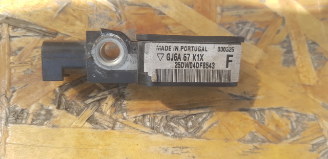 Датчик Ейрбег передній GJ6A57K1X MAZDA
