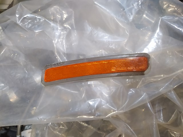 Катафот (відбивач) переднього бампера, правий 7411974 BMW