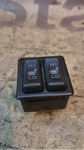 Кнопка включення обігріву сидіння 8610A030 MITSUBISHI