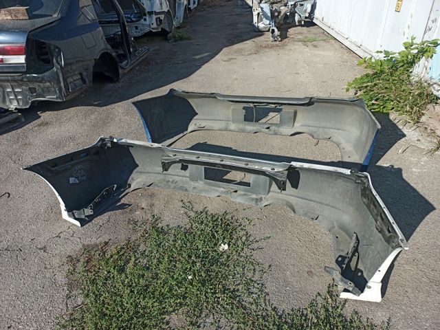 Бампер задній 57704FE060 SUBARU