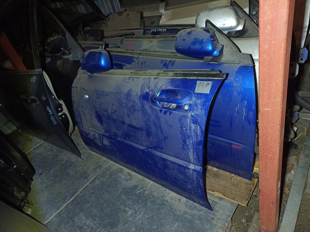 Водійські двері 60009FE010 SUBARU
