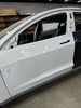 двері кабіни Tesla Model 3