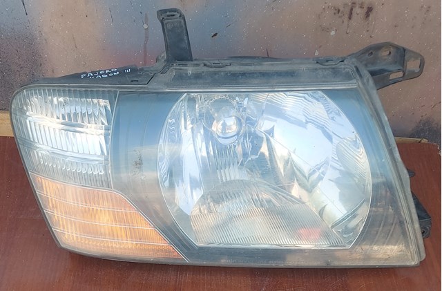 Фара передня права 10087420 MITSUBISHI