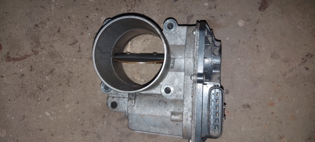 Дросільна заслінка в зборі 1450A033 MITSUBISHI