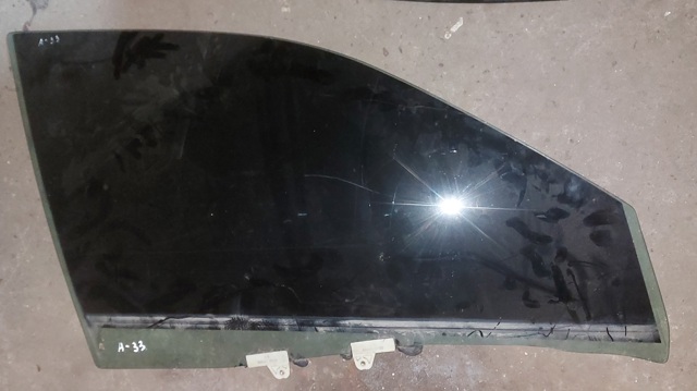 Скло пасажирських дверей 803003Y563 NISSAN