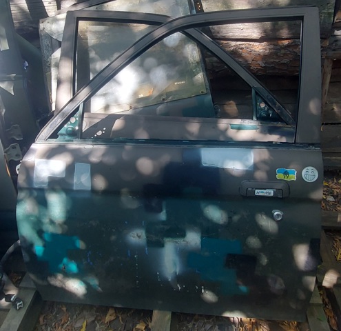Двері передні, ліві Mitsubishi L 200 3