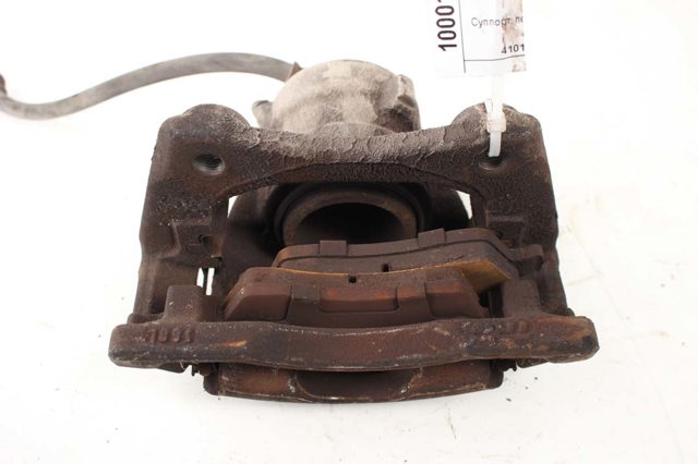 Супорт гальмівний, передній, лівий 41011AX601 NISSAN
