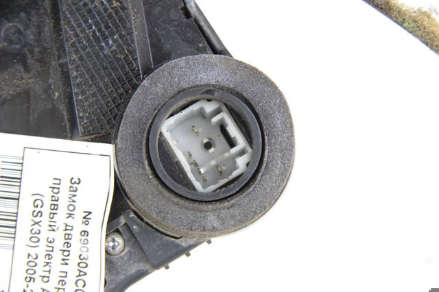 Замок двері правої передньої 69030AC080 TOYOTA