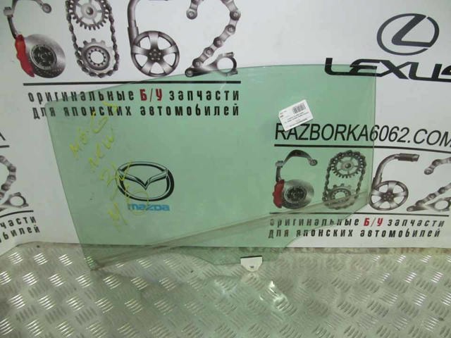Скло задньої двері лівої GHK173510B MAZDA