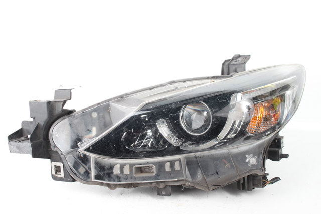 Основна фара в зборі ліва GMG551041E MAZDA