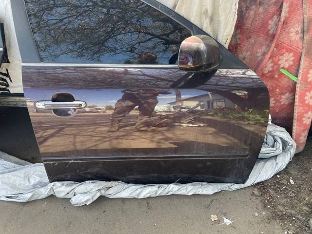 Дверка передня права 760043K010 HYUNDAI
