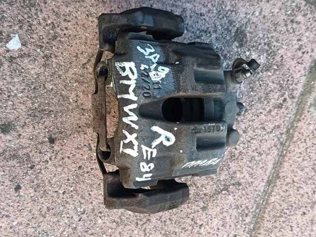 Супорт гальмівний задній правий 34216768698 BMW