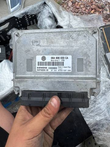 Модуль управління двигуном 06A906033CA VAG
