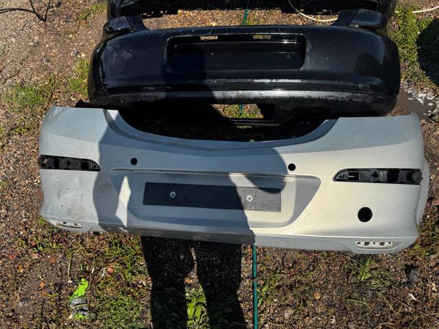 Буфер (бампер) задній Opel Astra H TWINTOP