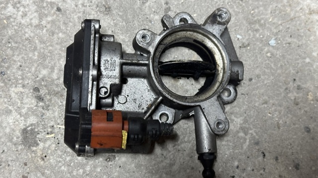 Блок дросельної заслінки 55564164 OPEL