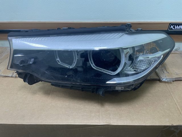 Фара ліва 63117214959 BMW