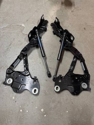 Завіс капота, лівий 41009477741 BMW