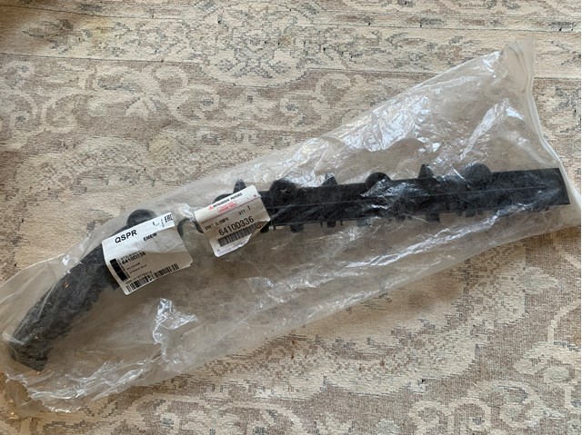 Ліве кріплення заднього бампера 6410D336 MITSUBISHI