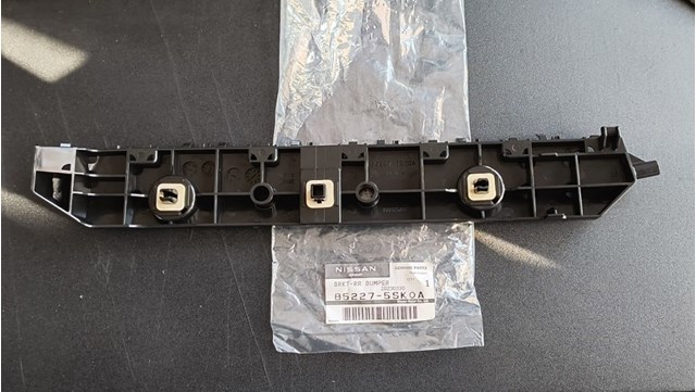 Напрямна заднього бампера, ліва 852275SK0A NISSAN