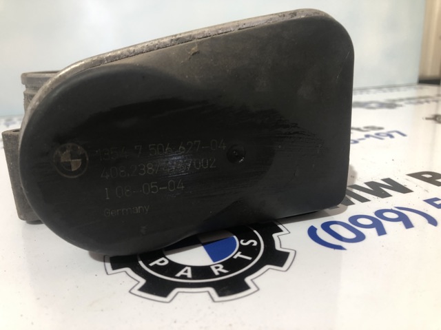Дросільна заслінка в зборі 7506627 BMW