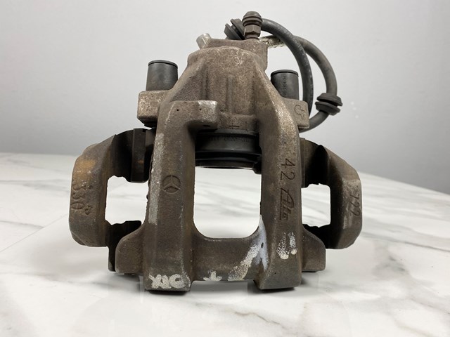 Задній гальмівний супорт лівий A0044203983 MERCEDES