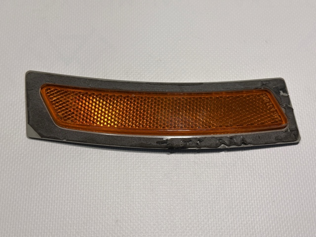 Катафот (відбивач) заднього бампера, лівий 7295541 BMW
