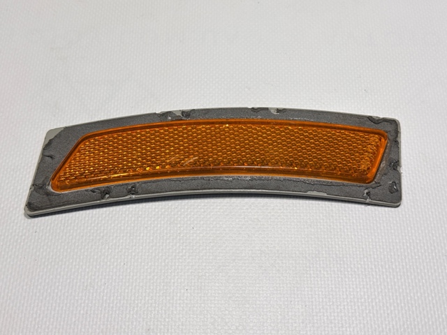 Катафот (відбивач) заднього бампера, правий 7295542 BMW