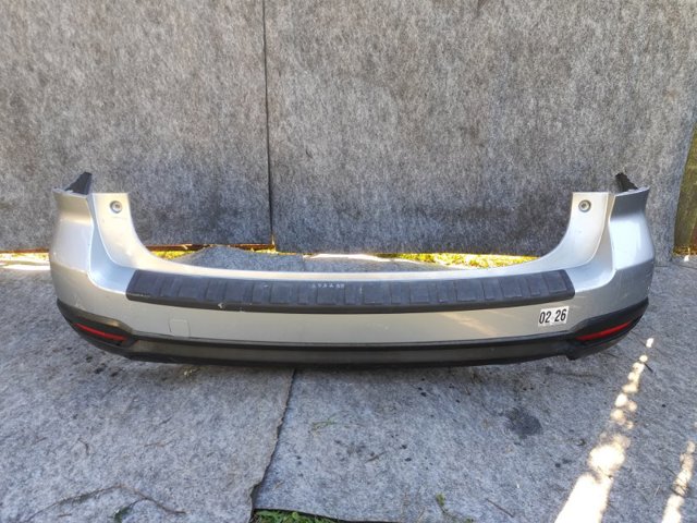 Кожух бампера заднього 57704SG012 SUBARU