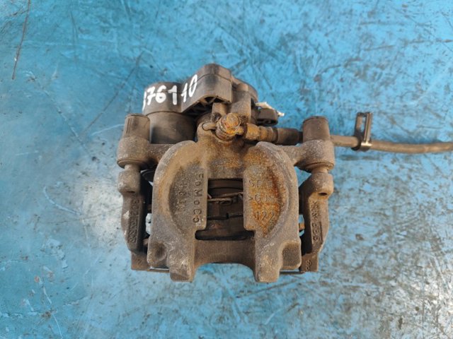 Супорт гальмівний задній правий DG9Z2552C FORD