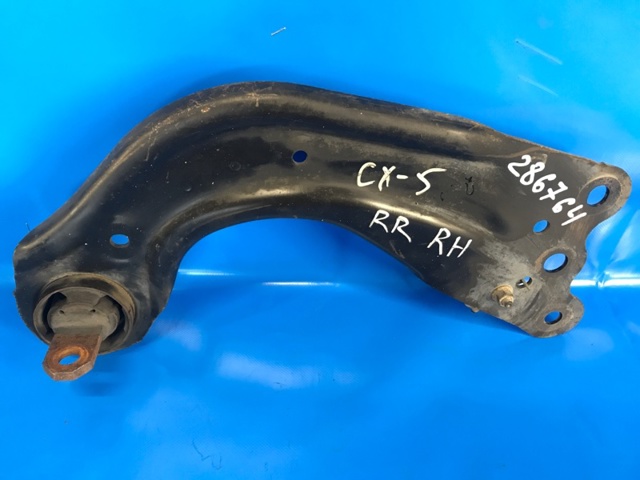 Важіль/тяга задньої підвіски подовжній нижній, правий KD3528200C MAZDA
