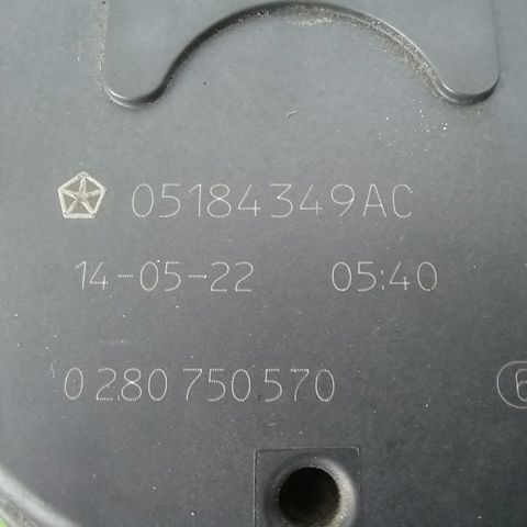 Дросільна заслінка в зборі 05184349AC CHRYSLER