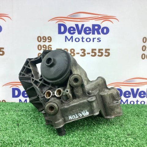 Корпус масляного фільтра 077115401AC VAG