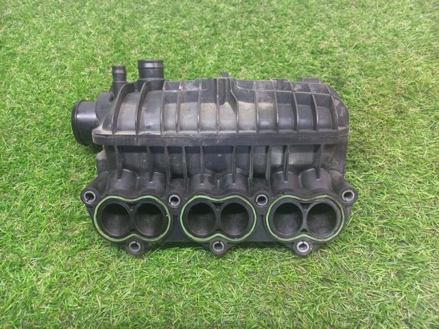 Колектор впускний 1047092S01 FORD