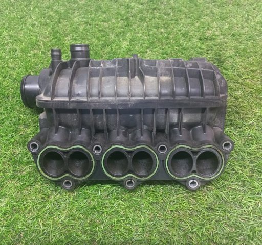 Колектор впускний 1047092S01 FORD