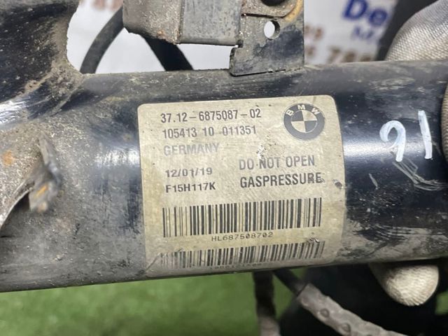 Амортизатор задній, лівий 37126875087 BMW