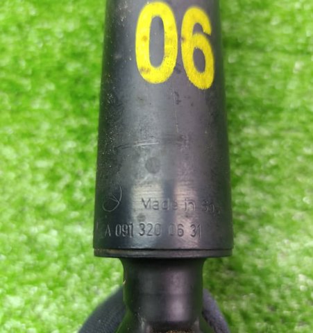 Амортизаційна стійка задня 562005DB0A NISSAN