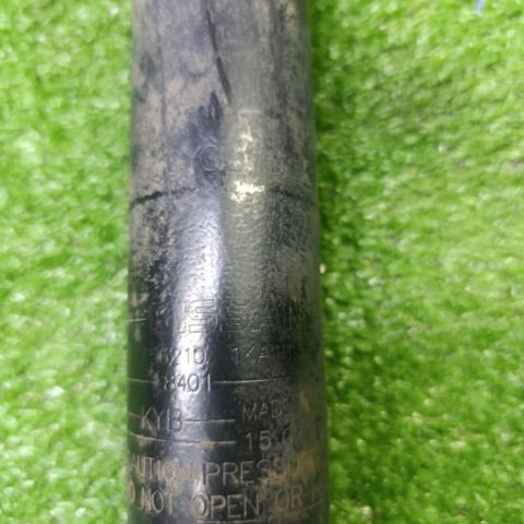 Амортизатор задній 562101KA1B NISSAN