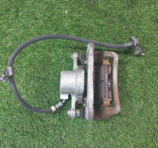 Супорт гальмівний задній правий 96626074 GM