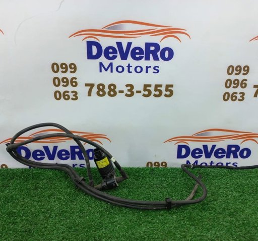 Моторчик омивача переднього скла DV6117664AA FORD