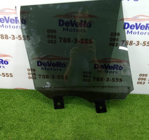 Скло заднє ліве LR052677 LAND ROVER