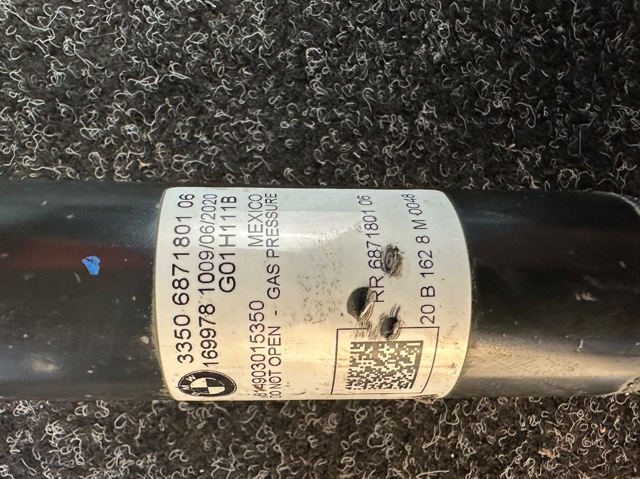 Стійка амортизатора задня 33526871801 BMW